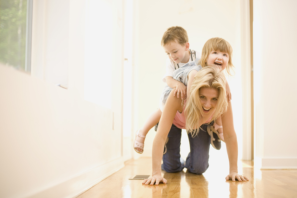 Playful mother and children